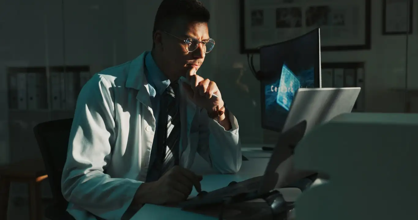 Doctor analyzing high-risk medical data related to sensitive health decisions